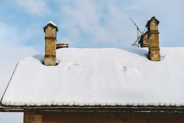 The Winter Weakness of Old Roofs: What Homeowners Need to Watch For - Green Metal Roofing